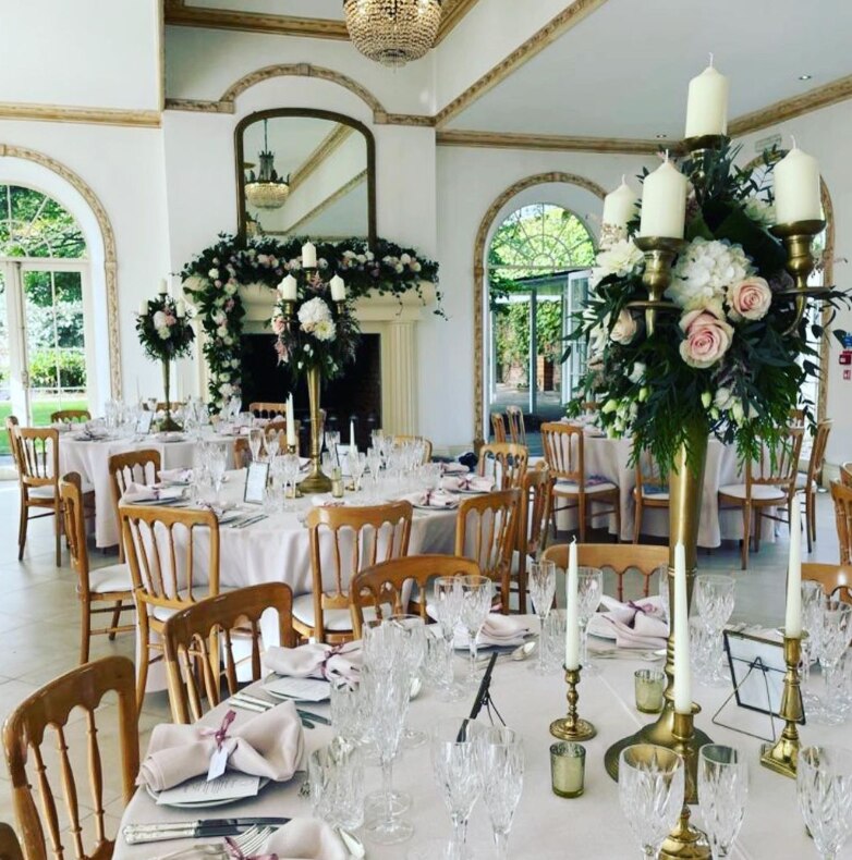 A wedding venue decorated with the most beautiful flowers